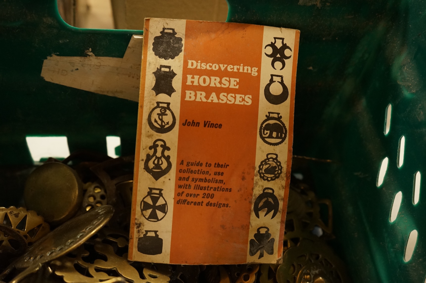 A collection of various horse brasses